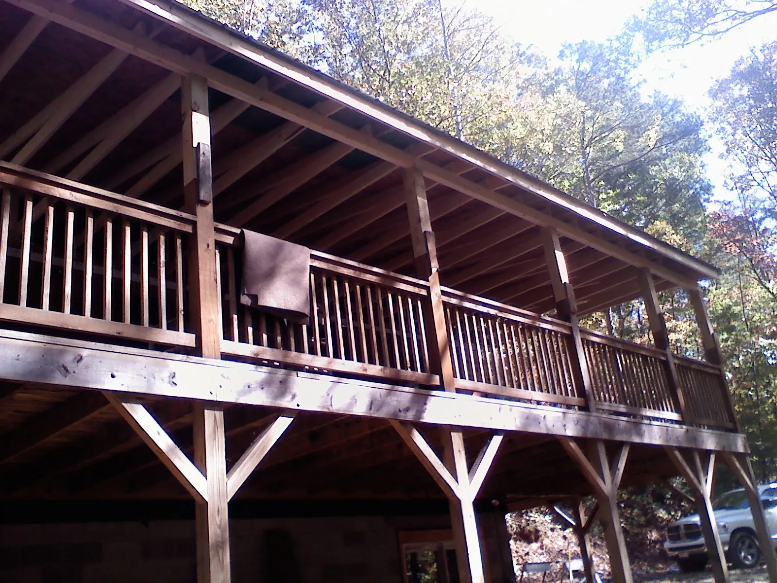 Timber framing under a new elevated porch and deck — Roof Leak Repair in Martins Ferry by Roofing Brothers